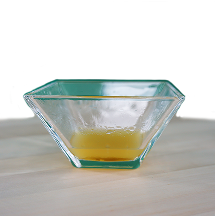 glass bowl, triangle bowl, clear glass, gold rim, yellow liquid